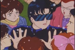 "Quick! He might be armed! Let's crowd around him and look judgmental!"