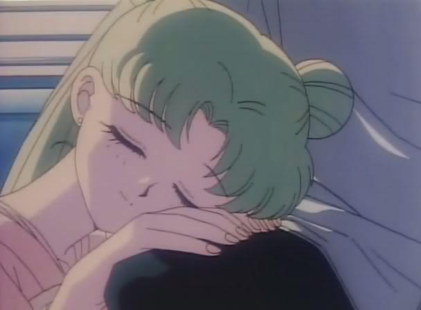 Usagi rests her head on Mamoru's knee