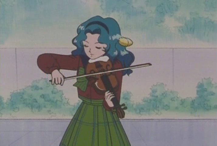 Michiru bounces a lemon off her violin