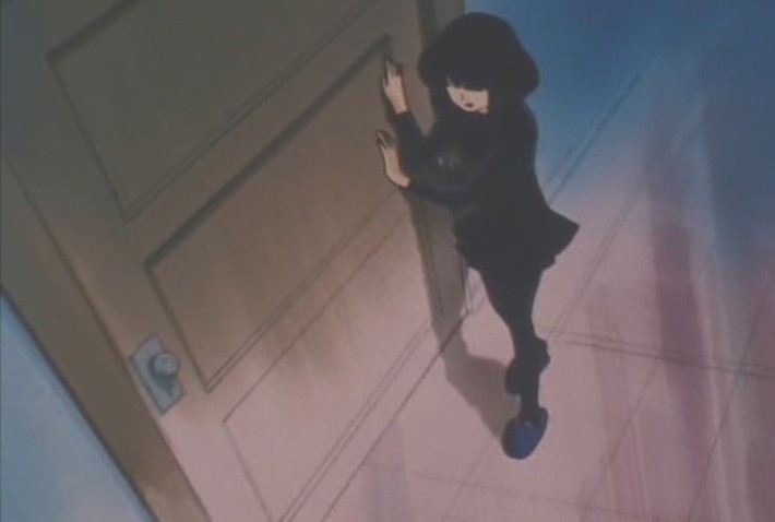 Hotaru walking down a corridor