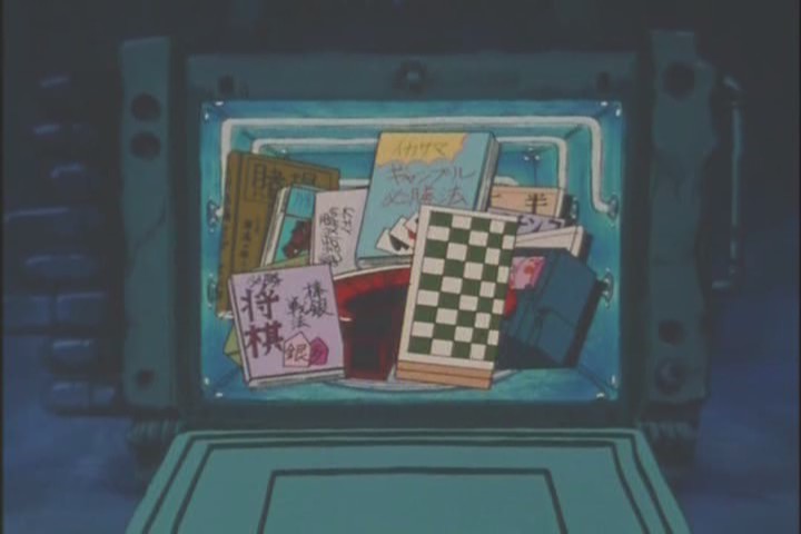 I think you can see a stack of the Professor's porn in the back