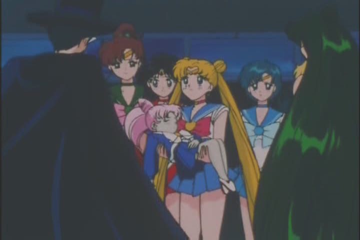 Seriously, she's not breathing in this shot. Sailor Moon is holding her dying kid in her arms. That's messed up