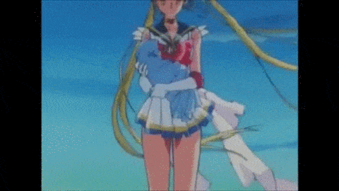 Sailor Moon holds Hotaru